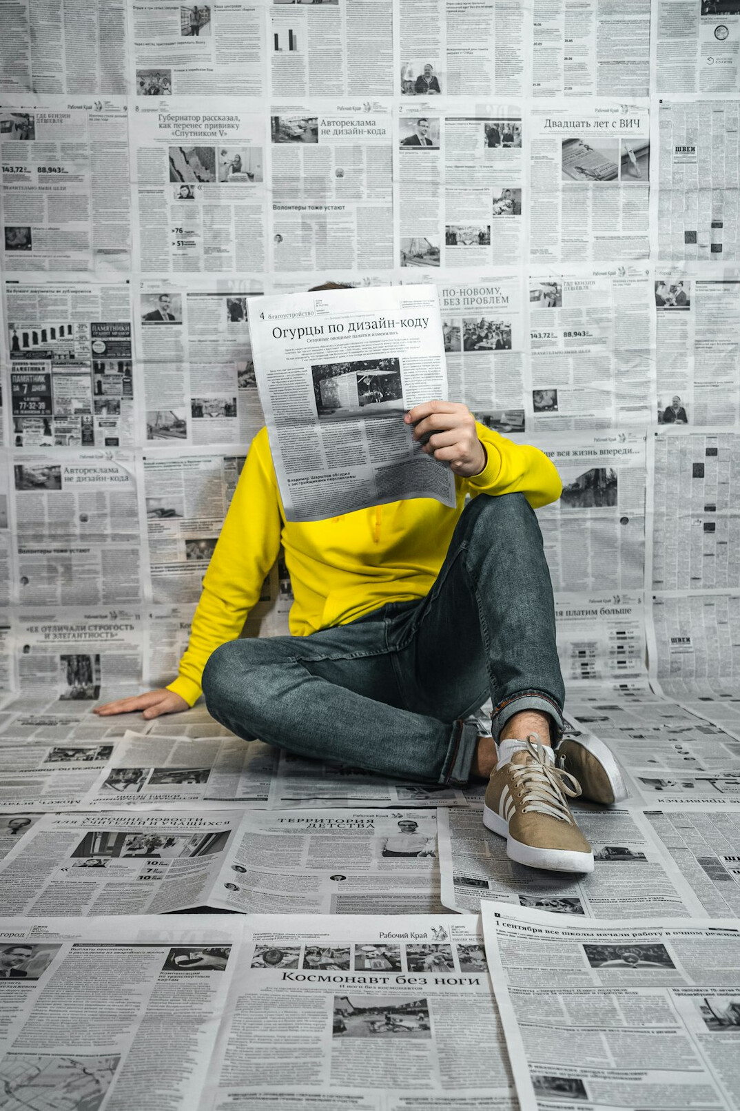 person reading newspaper